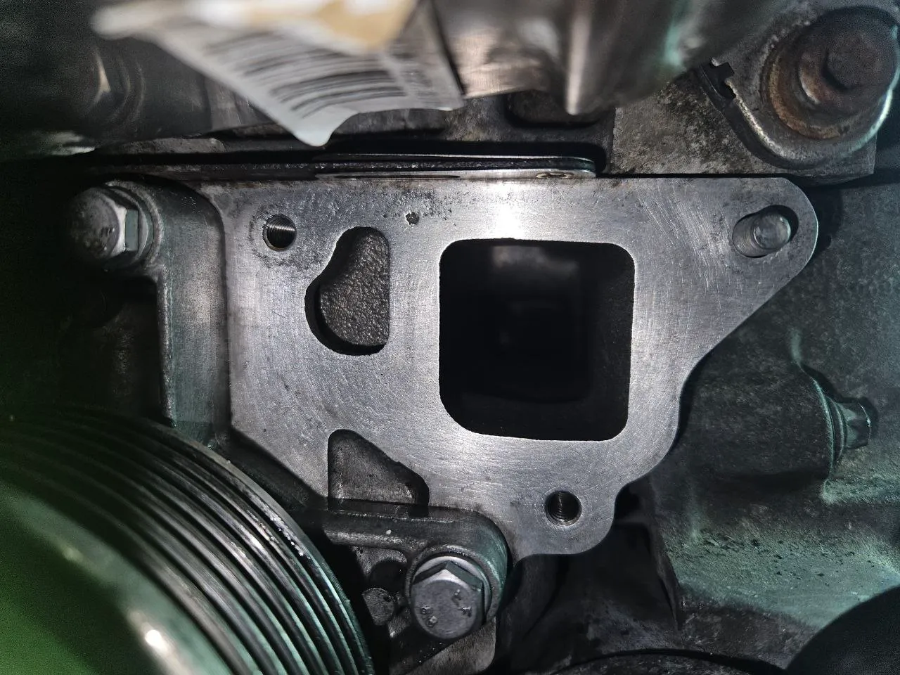 Cylinder head mating surface with the pipe removed